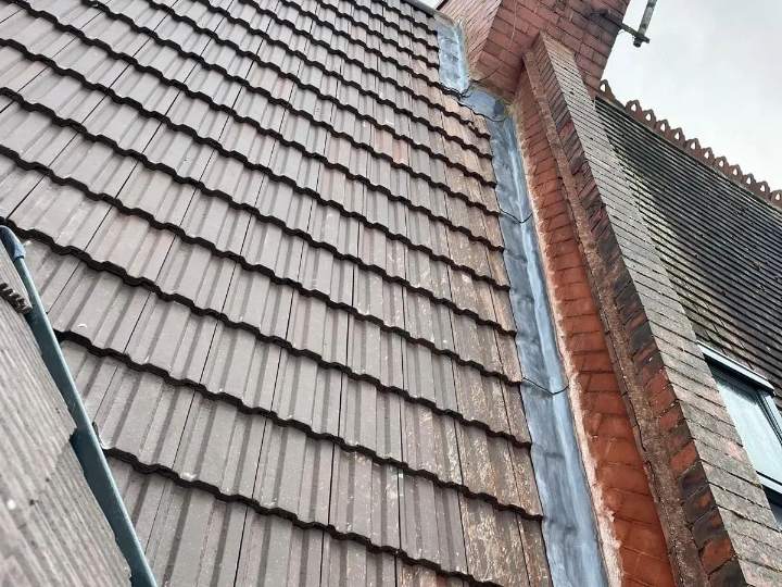 Tiling and lead flashing at a chimney